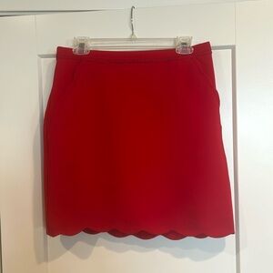 Beautiful red skirt with scalloped trim and detail. size LP.